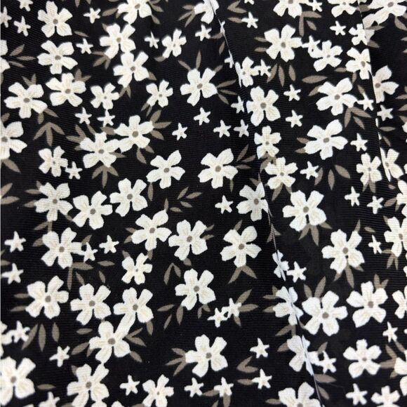 Floral Black and White Women's Jumpsuit with Flared Ruffled Legs - Picture 2 of 5